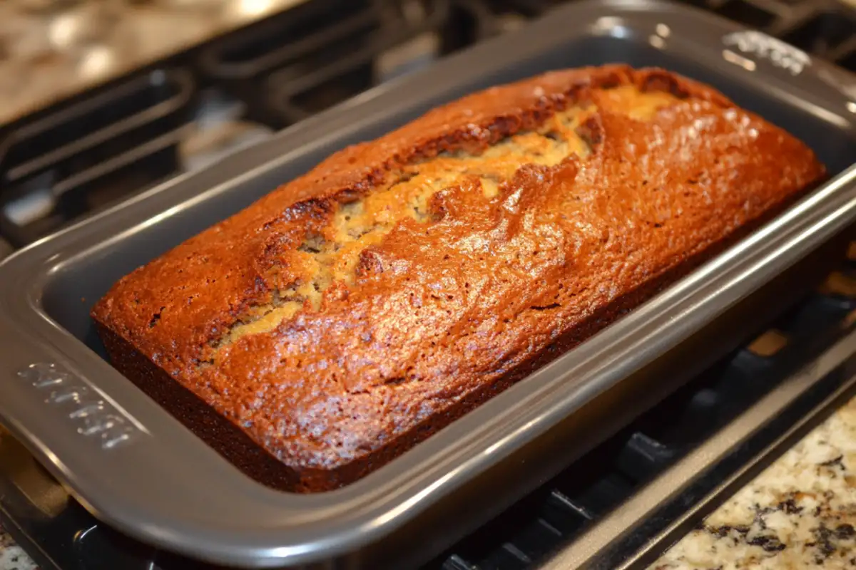 What is the number one mistake made when making banana bread - A top-down view of a moist banana bread loaf.